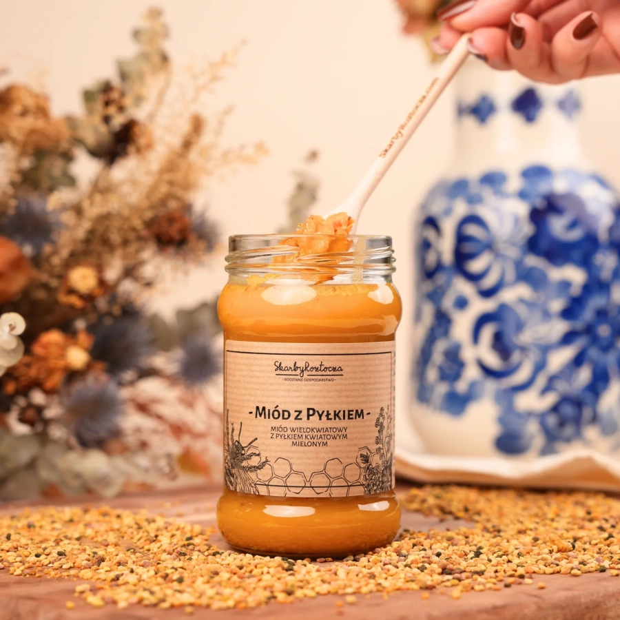 miel au pollen d'abeille moulu petit pot trésors de roztocze cuillère consistance