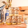 assortiment de differents miels 5 petits pots produit front3